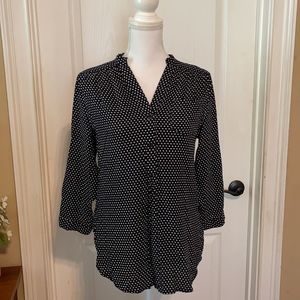 Navy and white polka dot 3 button v-neck blouse